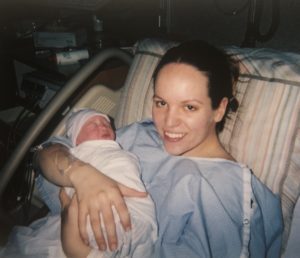 a teenage mom with her newborn baby after nine months of being unwed and pregnant