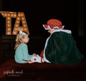 mrs claus and little girl