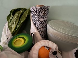 Produce in vegetable bags, with UnPaper Towels, fruit huggers and a bowl with a silicone cover.
