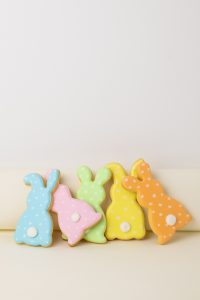 multi-colored stuffed bunnies in a row
