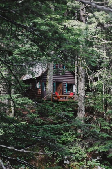 a remote cabin in the woods symbolizing not being overly accessible