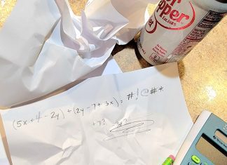 a crumpled paper with math equations on it next to a pencil, calculator, and can of diet soda representing the nightmares of math