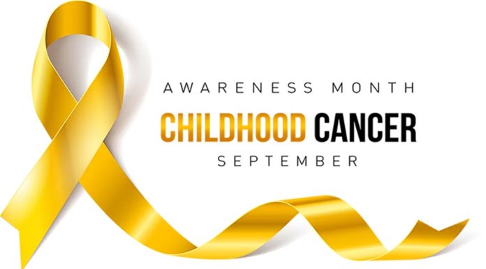 a yellow ribbon with the words, “childhood cancer awareness month"