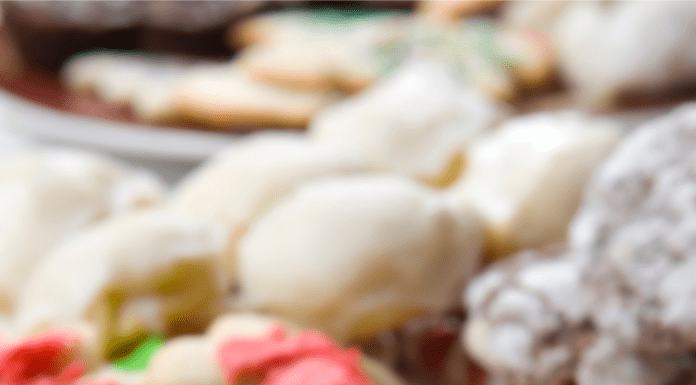 a close-up of a plate of holiday cookies at a holiday cookie exchanges